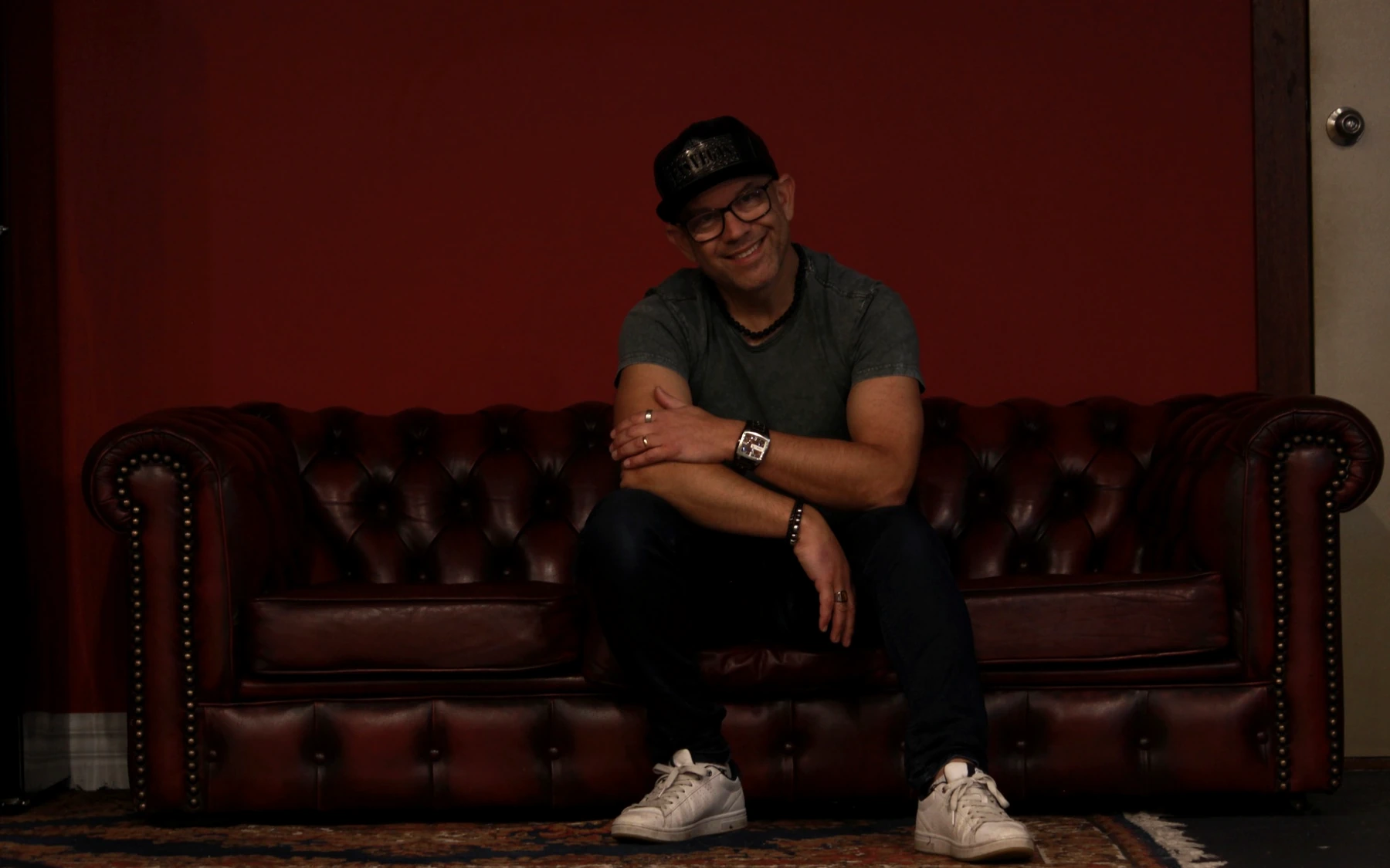 Steve Rault seated in the Hayshed Music lounge